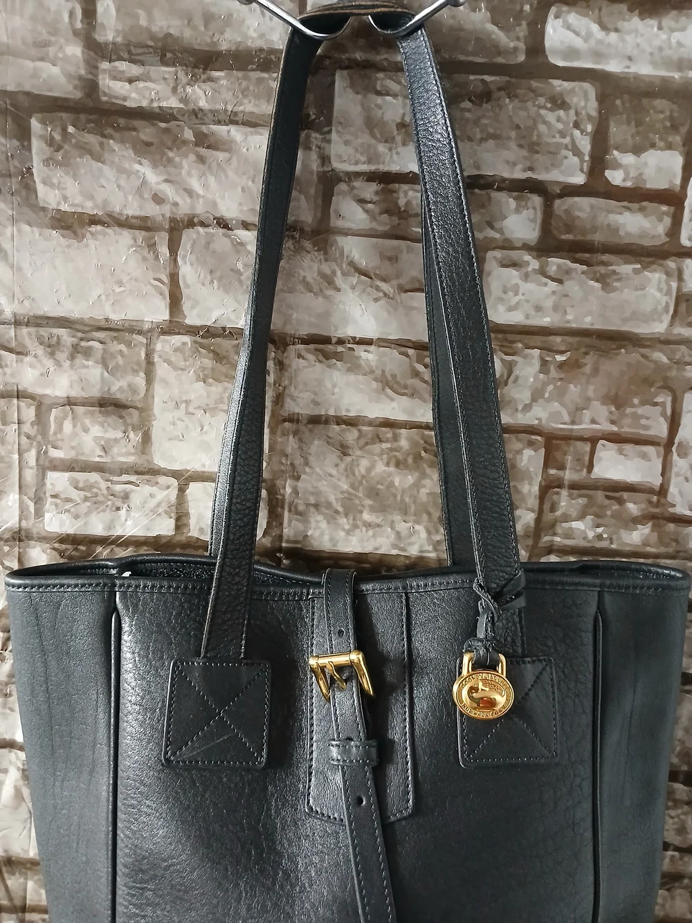 Dooney & Bourke Black Leather Tote with Gold Charm